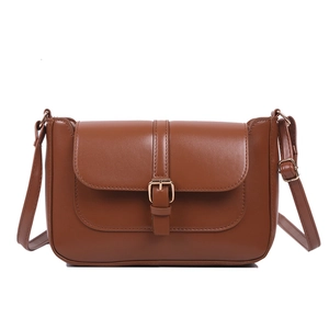 Classic vintage brown faux leather crossbody bag with gold buckle and adjustable strap