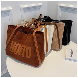 Detailed collection of faux suede tote bags with large HOMTO letters in four colors
