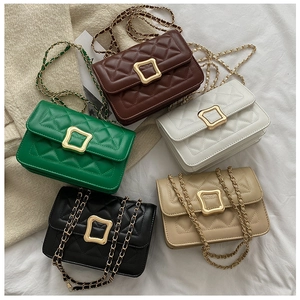 Flat lay of quilted leather chain bags in five colors with gold square clasps