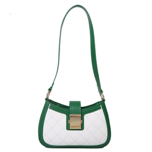 Modern green and white patchwork shoulder bag with quilted pattern and gold buckle
