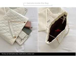 Détail de l'intérieur d'un grand sac cabas matelassé blanc montrant sa capacité