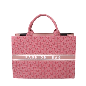 Sac fourre-tout en toile rose avec motif M et poignées en ruban fashion