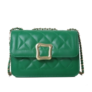 Classic green quilted crossbody bag with diamond patterns and golden chain strap for women
