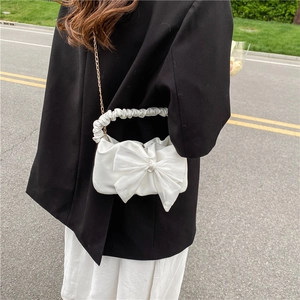 White cloud pleated handbag with large bow and metal chain strap for women