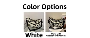 Detail view of canvas tote bags with black and white stripes and checkerboard charms