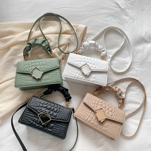 Chic croc-effect crossbody bags in four colors with pleated handles and metal buckles