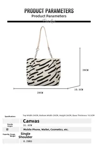 Detailed size specifications for a canvas striped tote bag with dimensions and metal chain