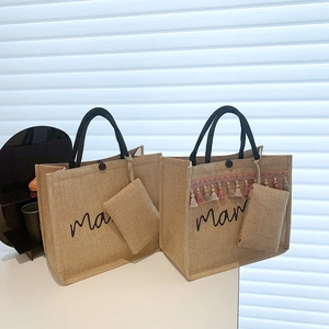 Fashionable jute tote bag for women with tassel accents and mama printed lettering