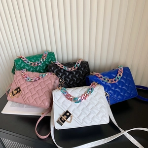 Five elegant woven texture crossbody bags with colorful acrylic chains and gold hardware