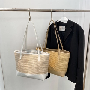 Straw woven tote bag with leather trim for summer beach vacations in white and khaki