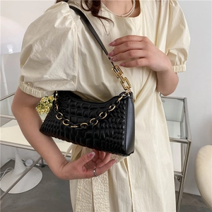 Fashionable black baguette shoulder bag with crocodile pattern and gold chain strap