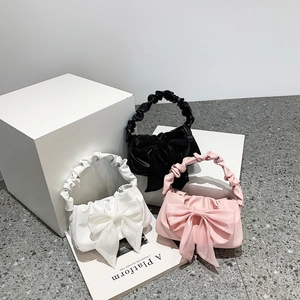 Mini sacs bandoulière tendance pour femmes avec nœud en cuir PU en noir, blanc et rose