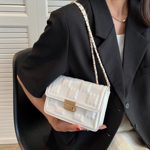 Stylish white crossbody chain bag with embossed geometric texture and gold metal lock