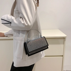 Chic black rhinestone square handbag with silver ring handle and chain strap for women
