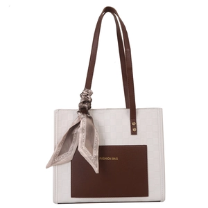 Women's checkered tote bag in white and brown leather with a decorative silk scarf handle