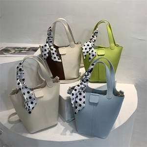 Minimalist bucket handbag for women featuring decorative silk scarves in four colors