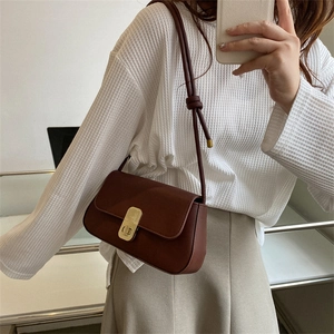 Retro polygon burgundy crossbody bag with golden buckle and knotted shoulder strap