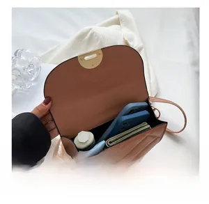 Interior view showing the large capacity of the quilted leather shoulder bag for women