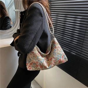 Vintage floral jacquard hobo shoulder bag with white leather handle and ethnic chic patterns