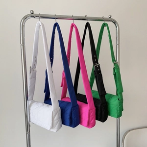 Minimalist quilted shoulder bags in five colors with adjustable wide straps and flap