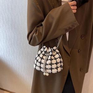 Classic tweed checkered mini bucket bag with silver chain strap and pearl drawstring charms
