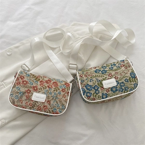 Retro floral jacquard crossbody bags with wide straps and white leather trim