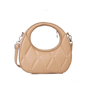 Quilted beige moon bag with circular handle and detachable shoulder strap in faux leather