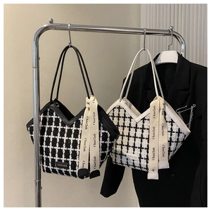 Plaid tweed tote bag with ribbon handles in black and white woven pattern for women