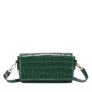 Dark green baguette shoulder bag with crocodile pattern finish and gold hardware accents