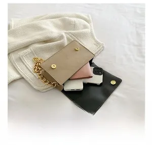 Interior view showing the storage capacity of the velvet chain crossbody bag