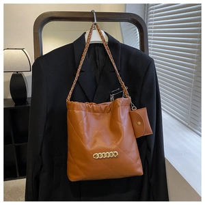 Brown quilted shoulder bag with gold chain detail and detachable round coin purse