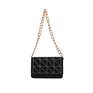 Elegant black velvet shoulder bag with silver stud geometry and gold chain strap