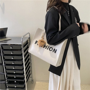 White casual tote bag with fashion letter print and a cute brown teddy bear pendant