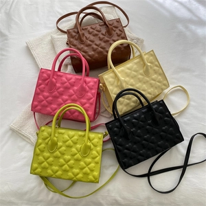 Retro PU leather crossbody bag set with embossed clover pattern in five vibrant colors