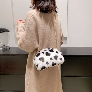 Borsa a tracolla alla moda in peluche con stampa mucca e catena dorata elegante