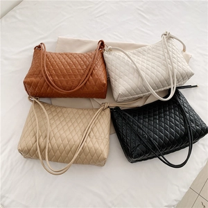 Quilted rhombus bucket bag for women in black, white, beige and brown color variants