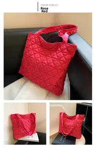 Detailed views of rose red quilted tote bag with diamond stitching and web handles
