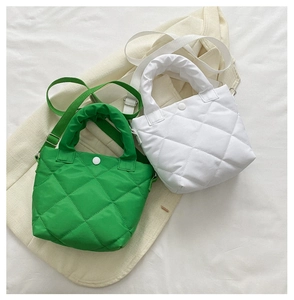 Quilted nylon small square bag in green and ivory white with padded handles and snap button