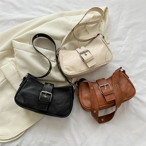 Chic square crossbody bags in black, beige, and brown with metallic buckle details
