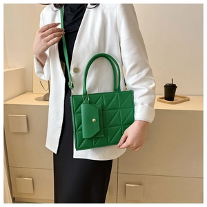 Green PU leather crossbody bag with quilted triangle texture and mini pouch detail