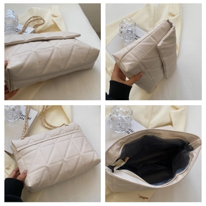 Dettaglio della borsa trapuntata beige con capacità interna e cuciture fini