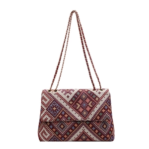 Chic multi-color bohemian woven crossbody bag with stylish gold chain strap and red leather