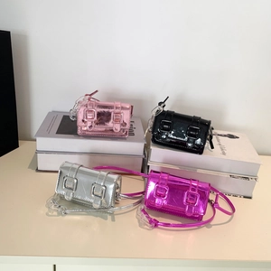 Mini metallic crossbody bags in four colors with clear acrylic chain and buckle detail