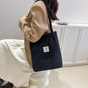 Elegant black corduroy tote bag for women with casual style and soft texture straps