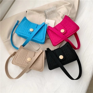 Crocodile embossed rectangular underarm bags in blue, pink, beige, and black colors