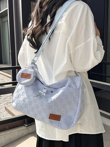 Fashionable light blue woven tote bag with checkerboard pattern and matching coin purse
