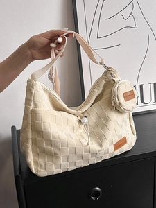 Fashionable cream checkered woven tote bag with a matching round coin purse detail