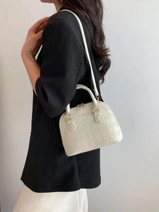Chic quilted shell bag in cream white PU leather with golden hardware and top handle