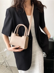Minimalist beige felt crossbody handbag for women with top handle and adjustable strap