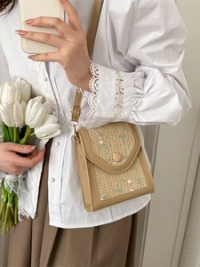 Chic beige lace woven crossbody bag with green flower embroidery and brown leather trim